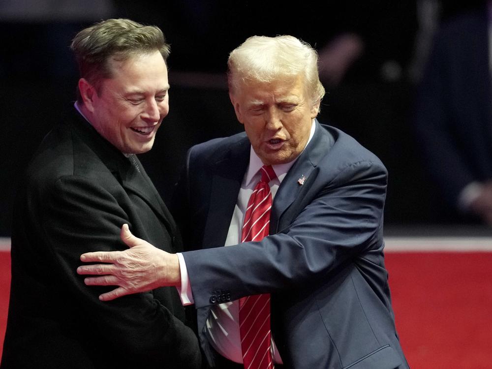 Elon Musk, left, and President-elect Donald Trump embrace at a rally ahead of the 60th Presidential Inauguration on Jan. 19, 2025, in Washington.