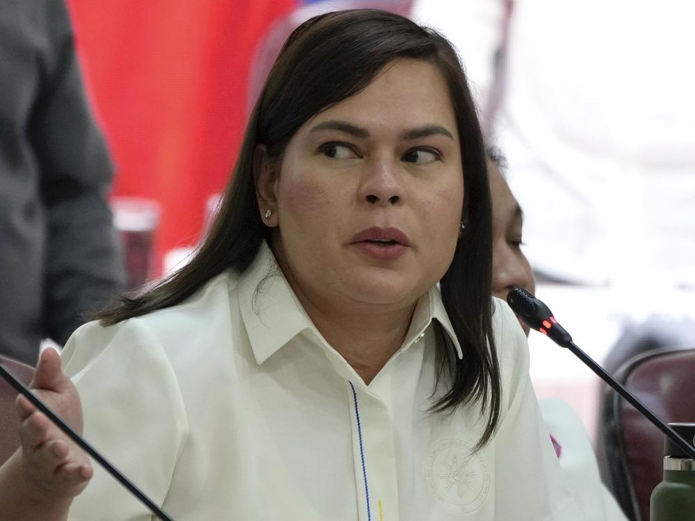 Philippine Vice President Sara Duterte gestures as she attends a hearing at the House of Representative in Quezon City, Philippines, Nov. 25, 2024.