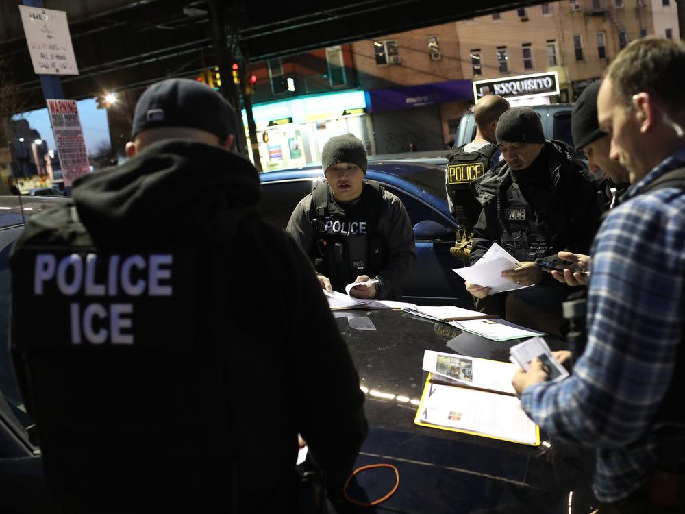 U.S. Immigration and Customs Enforcement officers prepare for morning operations to arrest those without legal status in April 2018 in New York City.