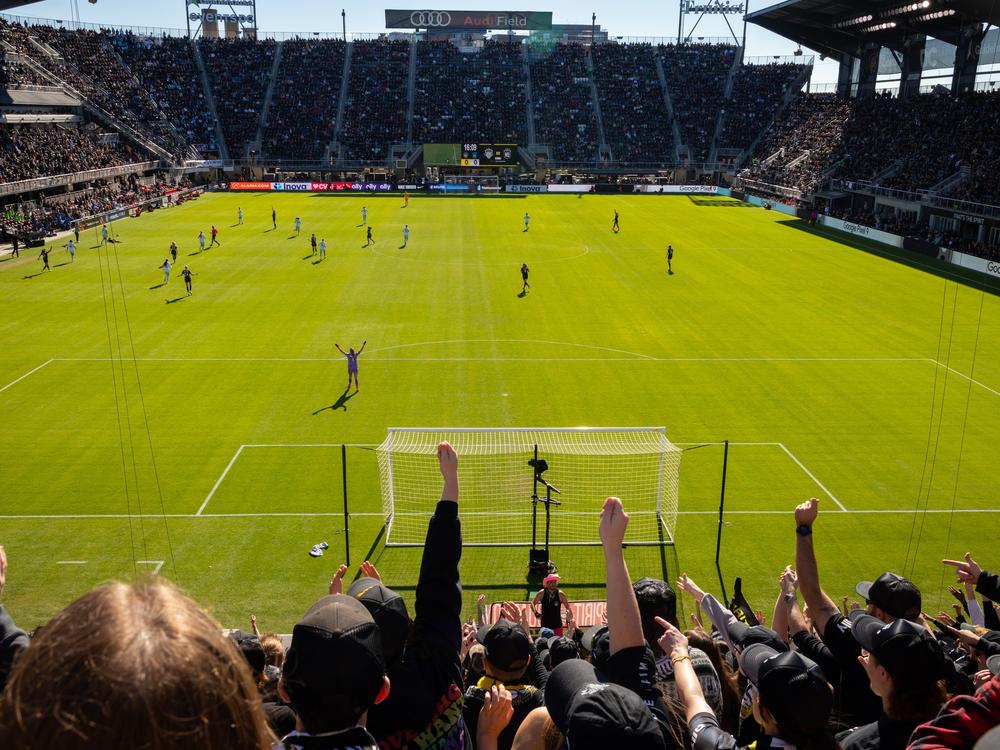 The fans of the Washington Spirit team, D.C.'s premiere women's soccer team, cheer en masse at Audi Field during the 2024 semifinals on November 16, 2024 in Washington, DC.