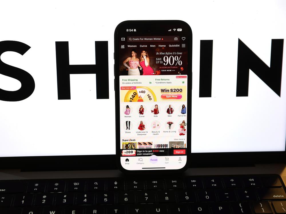 President Trump has ended the de minimis duty-free exception for China, as part of his imposition of tariffs. The app for Shein, the Chinese-founded discount online retailer, is seen here on a smartphone.