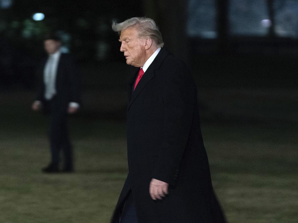 President Trump arrives back at the White House after visiting New Orleans to attend the Super Bowl. A federal judge on Monday found that the administration has not fully followed his order to unfreeze federal spending.