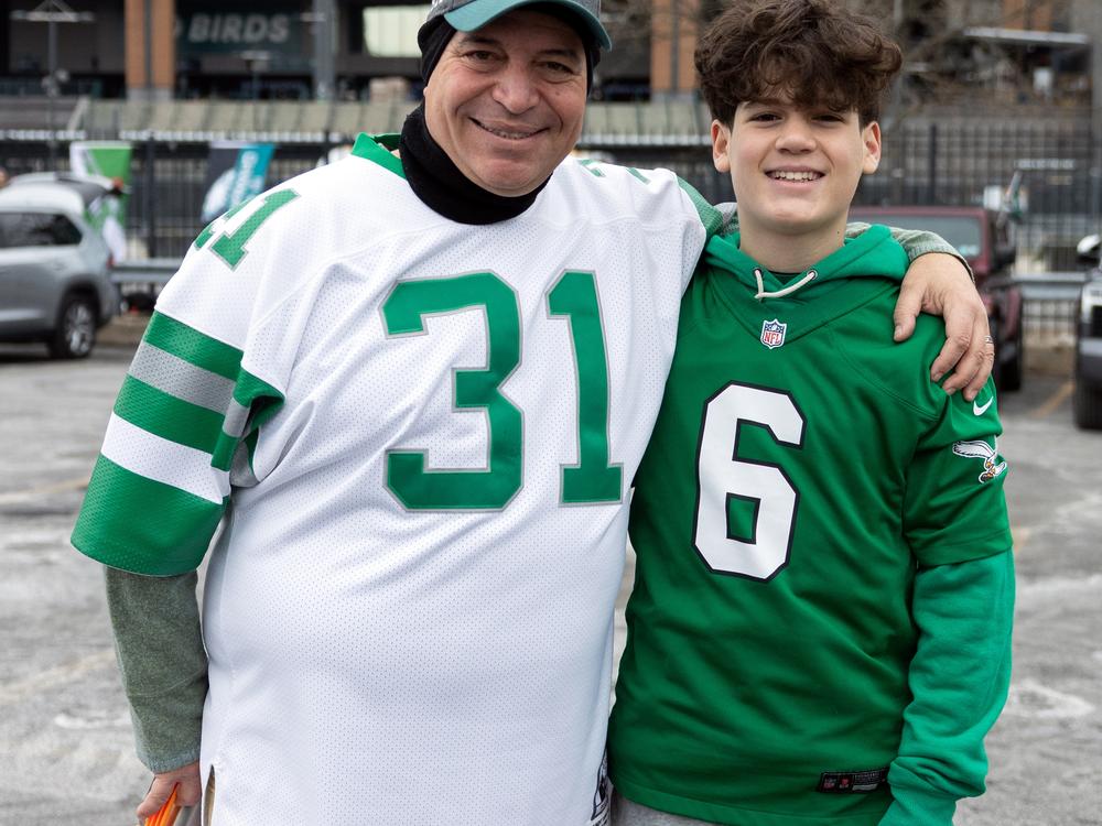 Philadelphia Eagles fans Kenny Justice (left), 59, and his son Roman, 14, share a passion for the Eagles which Kenny began to cultivate by singing the Eagles fight song, Fly Eagles Fly, to Roman while he was still in the womb.