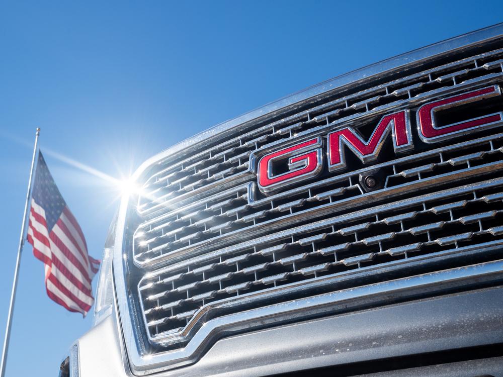 A GMC pickup truck is displayed for sale on a lot at a General Motors dealership in Austin, Texas. Last year, General Motors told investors in its annual report that 