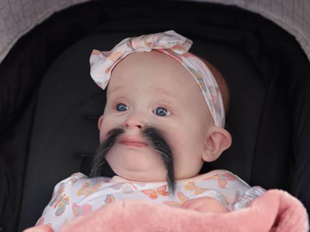 Eugene Levy's famous eyebrows uh ... get away from him ... in Little Caesars' commercial for Crazy Puffs.