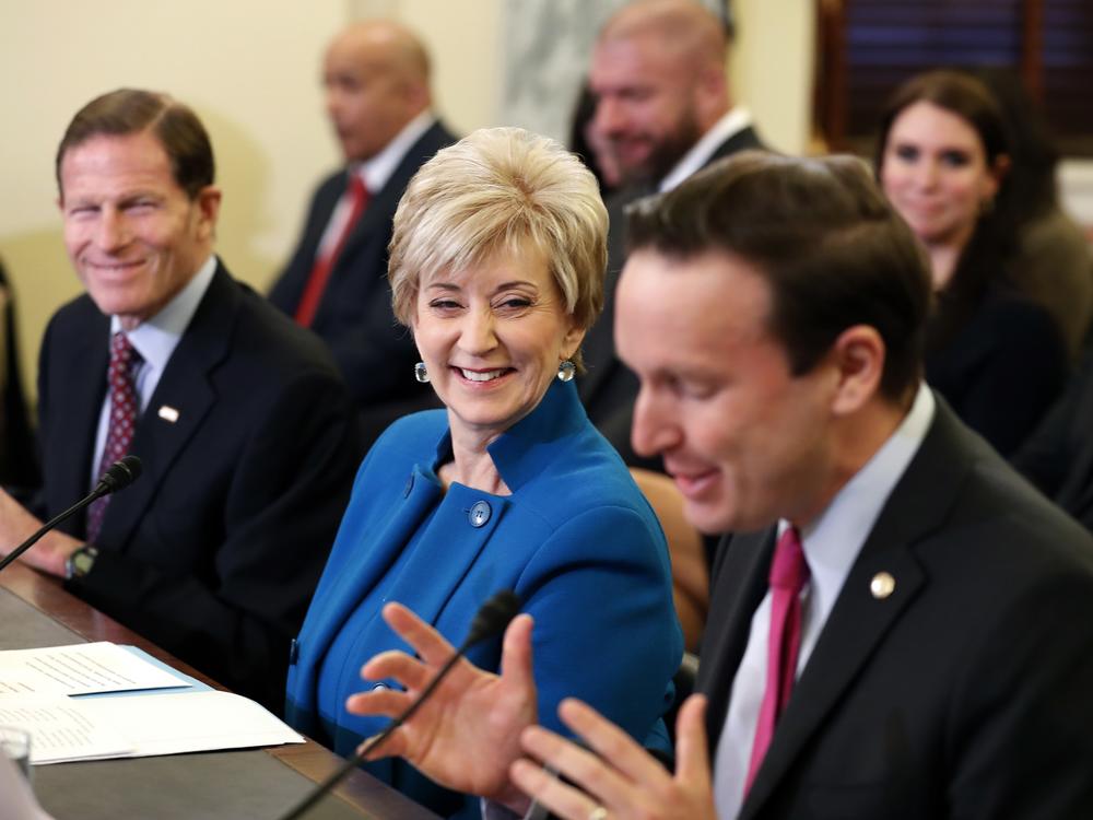 Connecticut Sen. Chris Murphy (right) introduces Linda McMahon at her 2017 Senate confirmation hearing for her nomination to the SBA. Sen. Richard Blumenthal, also of Connecticut, smiles on the left.