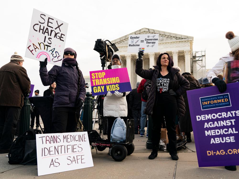 People who support state bans on gender-affirming care for young people gathered outside the U.S. Supreme Court on Dec. 4, when a case brought against Tennessee's ban was heard.