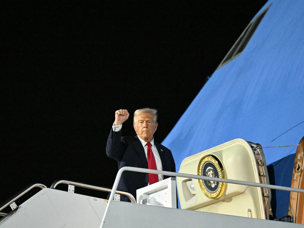 President Trump boards Air Force One in Louisiana as he returns to Washington after attending Super Bowl LIX.