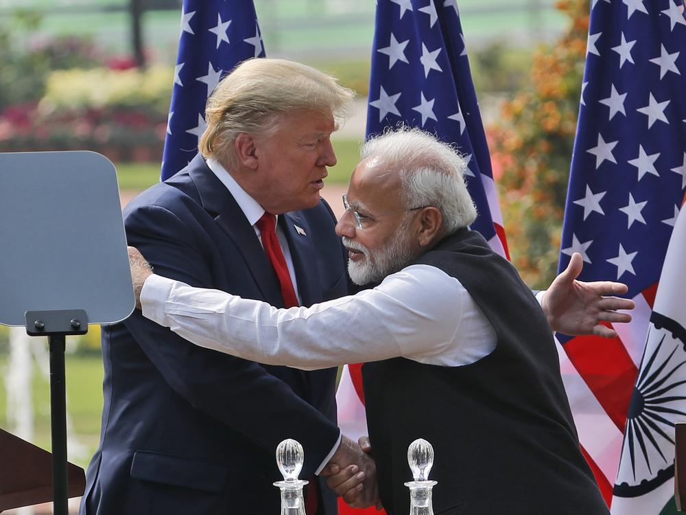 President Donald Trump and Indian Prime Minister Narendra Modi embrace after giving a joint statement in New Delhi, India, Feb. 25, 2020.