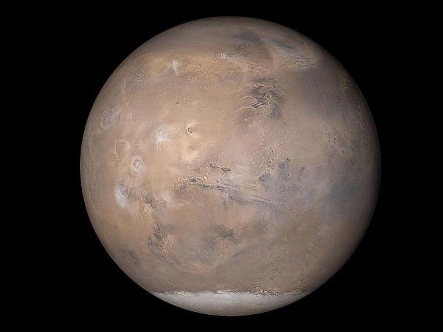 Mars, from composite of photos from three cameras from the Mars Global Surveyor (MGS) Mars Orbiter Camera (MOC) experiment, obtained on May 12, 2003.