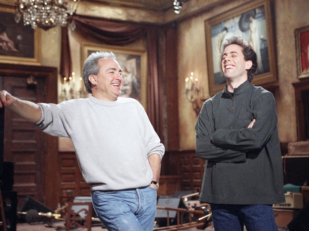 Lorne Michaels, left, shares a laugh with Jerry Seinfeld during an <em>SNL </em>rehearsal in 1992.
