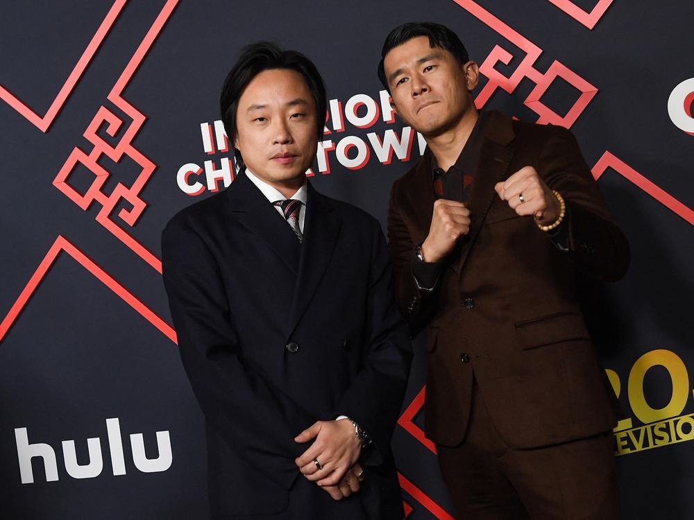 Jimmy O. Yang (left) and Ronny Chieng (R) at the premiere of Hulu's 