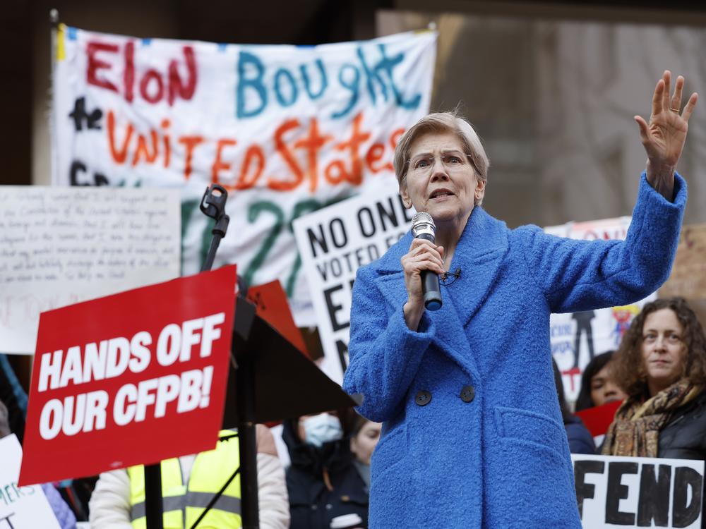 Sen. Elizabeth Warren, D-Mass., speaks at a rally outside the Consumer Financial Protection Bureau in Washington, D.C., on Feb. 10, 2025. Dozens of CFPB workers were laid off on Tuesday, the agency's union said.