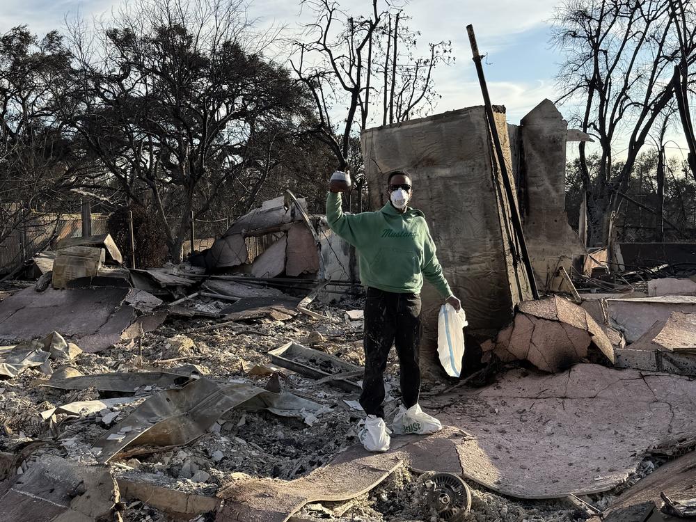 Obi in the wreckage of his home.