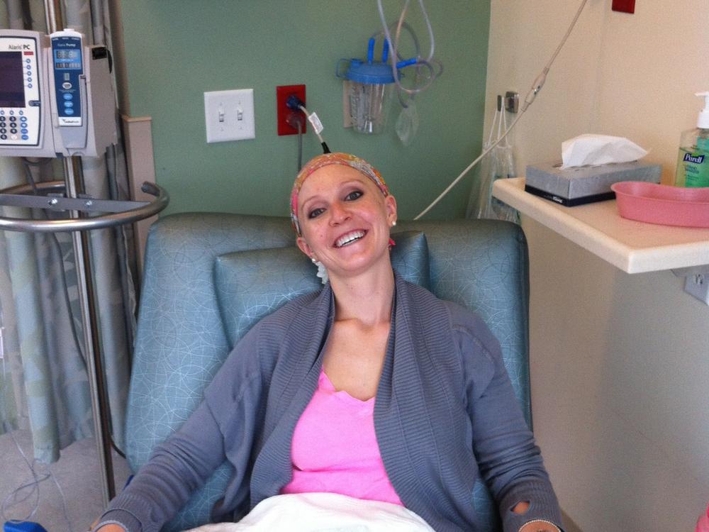 Maggie Loucks, photographed during a chemotherapy treatment, was a newlywed and a nursing student when she was diagnosed with hormone-receptor-positive and HER2-positive breast cancer.
