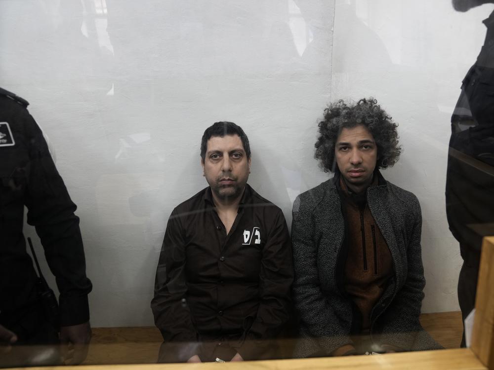 Booksellers Mahmoud and Ahmad Muna appeared in court Monday after their arrest in Jerusalem. Mahmoud told <em>Morning Edition</em> that the Israeli raid is 