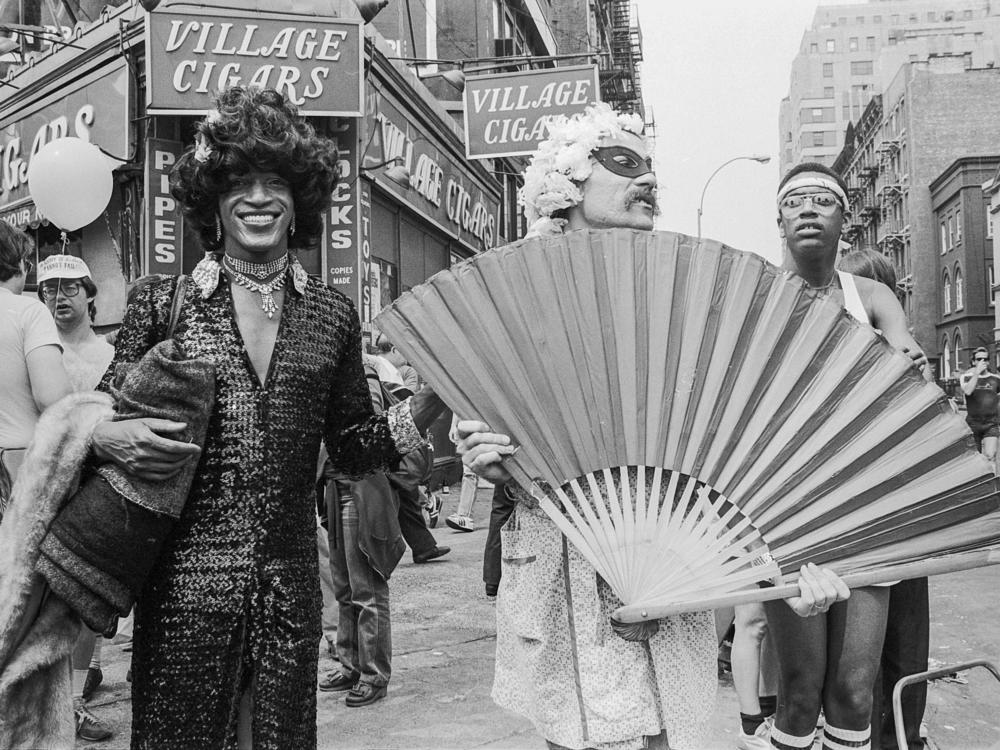 American gay liberation activist Marsha P. Johnson (center left), along with unidentified others, on the corner of Christopher Street and 7th Avenue during the Pride March in New York City on June 27, 1982.