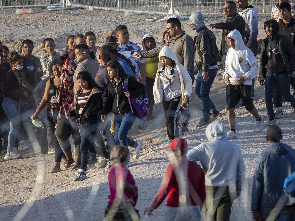 Unaccompanied minors walk towards U.S. Border Patrol vehicles after crossing over from Mexico on May 09, 2023, in El Paso, Texas.