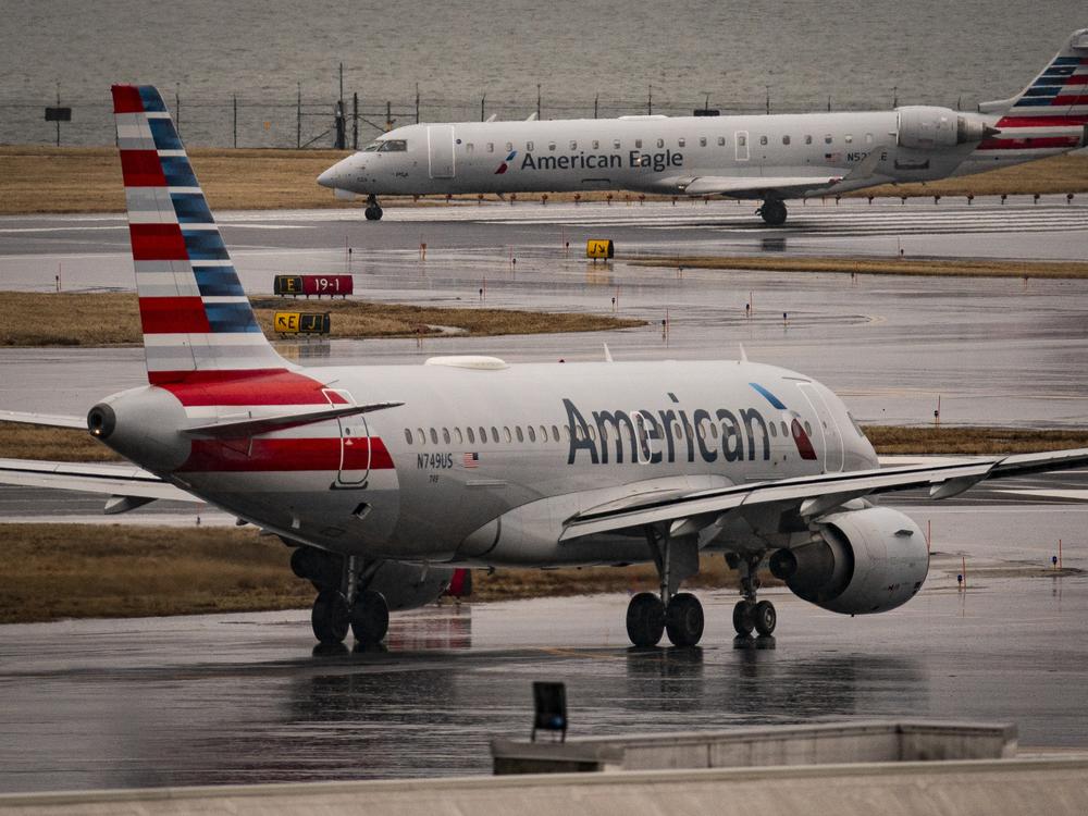 An American Eagle and American Airlines plane taxi on the runway at Ronald Reagan Washington National Airport, on February 6, 2025 in Arlington, Virginia. Investigators with the National Transportation Safety Board says a mid-air collision between an American Airlines flight and U.S. Army Black Hawk helicopter on January 29 may have been the result of a malfunctioning altimeter on the helicopter.