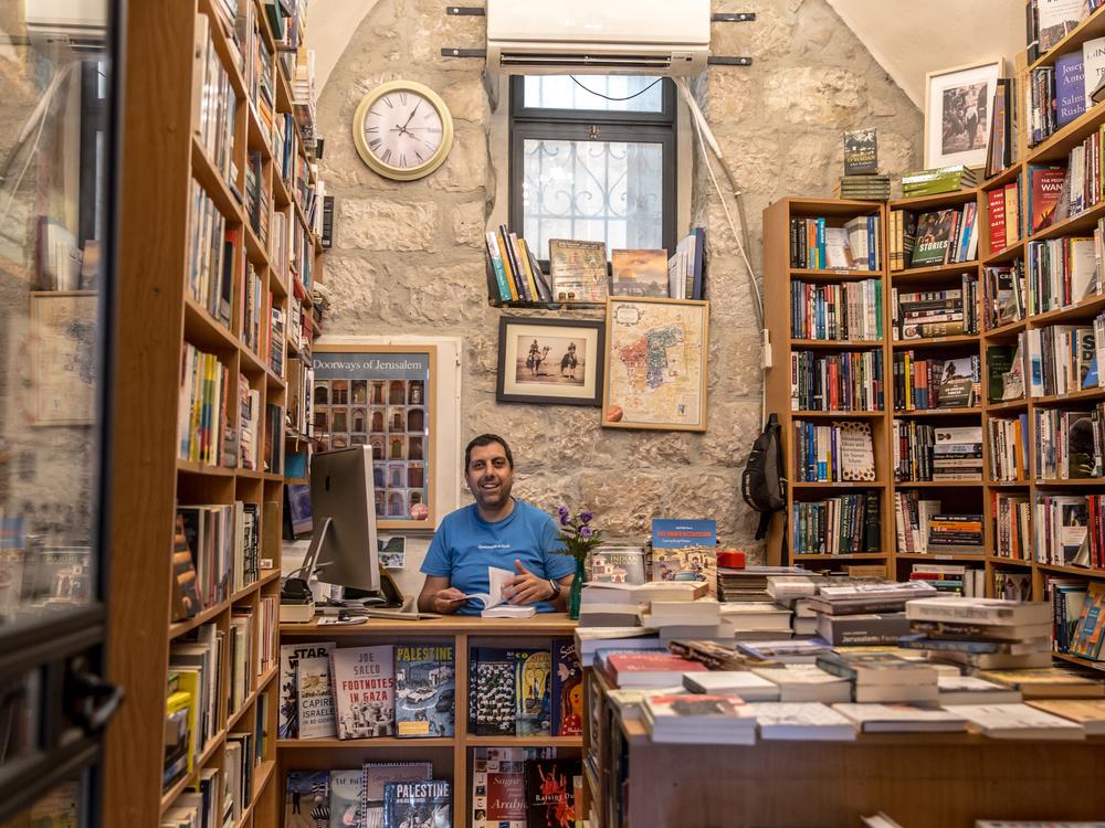 Mahmoud Muna inside a branch of the Educational Bookshop chain in East Jerusalem in July 2024.
