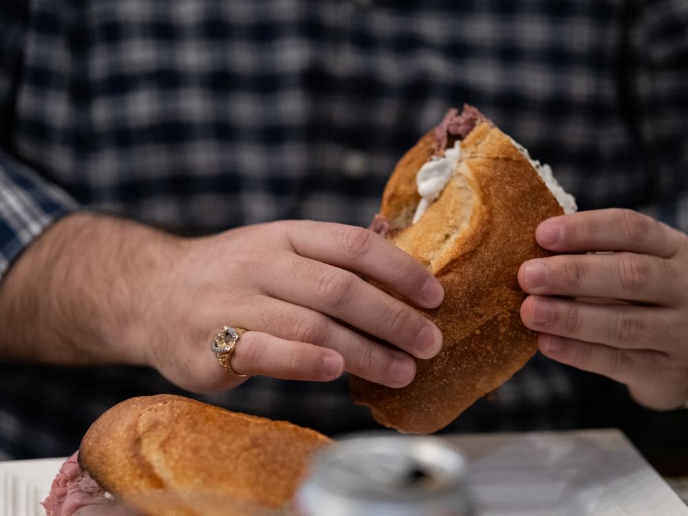 Peter Giunta, Chairman of the New York State Young Republicans, eats a sandwich at Filoncino Cafe - Eltingville, in Staten Island, New York City, on Wednesday, Feb. 12, 2025.