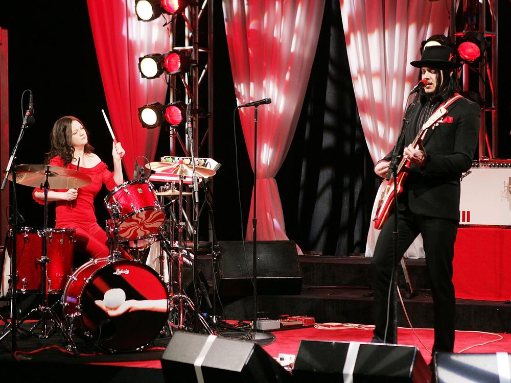 Jack White and Meg White of The White Stripes perform on <em>The Daily Show With Jon Stewart</em>, the first live band performance for the show, on Dec. 1, 2005, in New York City.