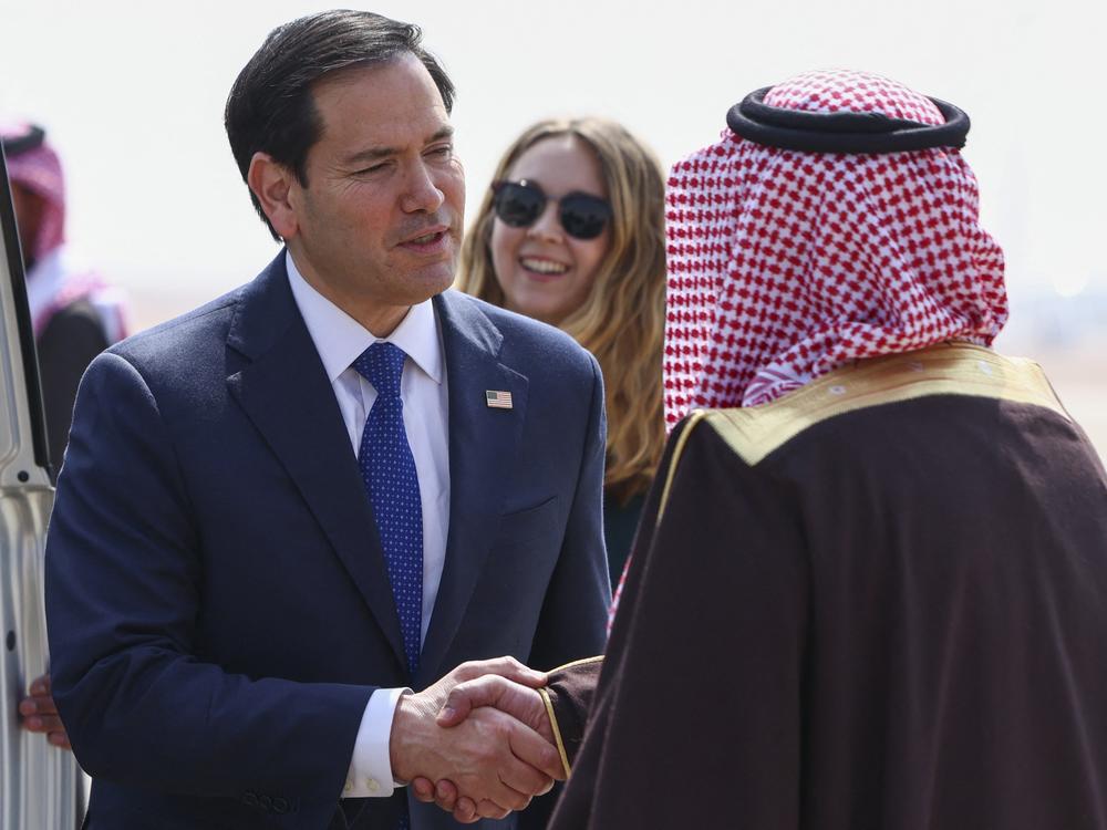 Secretary of State Marco Rubio is received by Saudi Arabia's Deputy Minister for Protocol Affairs Abdulmajeed al-Smari upon arrival at King Khalid International Airport in Riyadh on Monday.