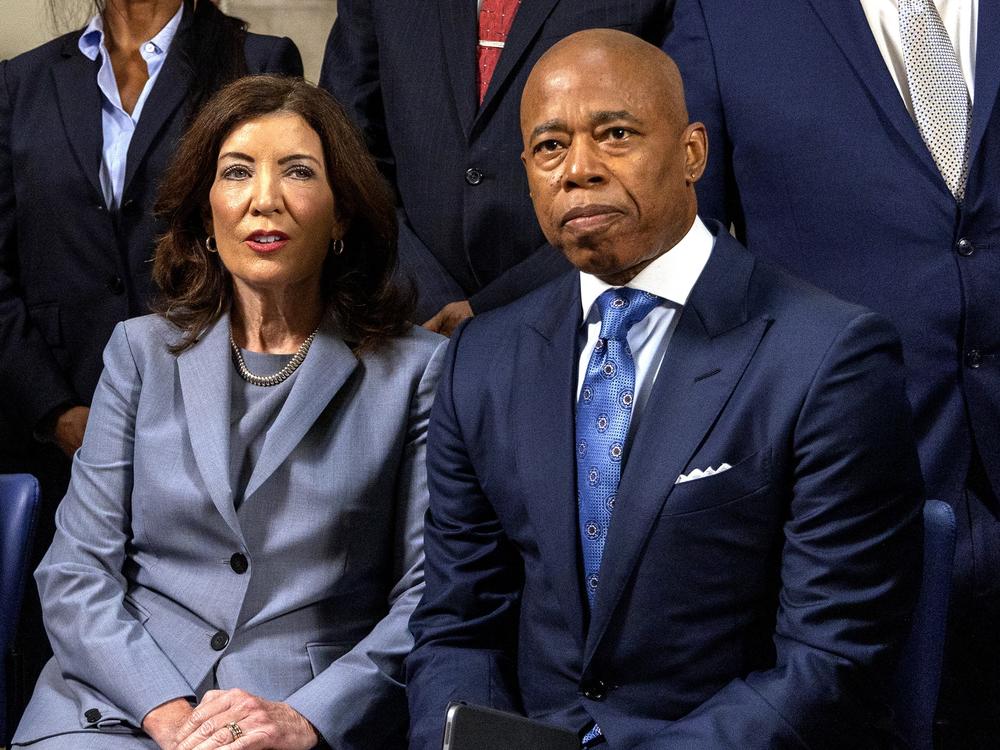 New York Governor Kathy Hochul, at left, has signaled she may use her authority to force New York City Mayor Eric Adams, a fellow Democrat, from office.  Hochul said she plans to meet with 