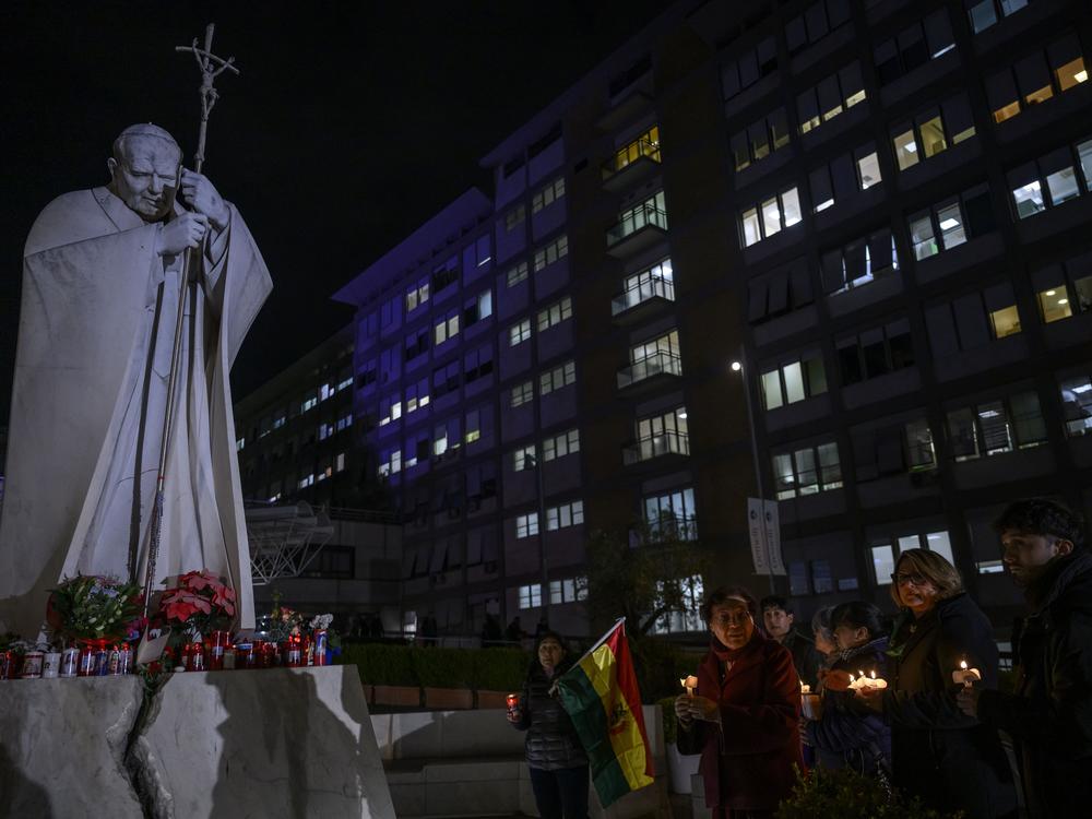 Faithful pray for Pope Francis outside the Policlinico A. Gemelli Hospital in Rome, where Pope Francis is hospitalized.