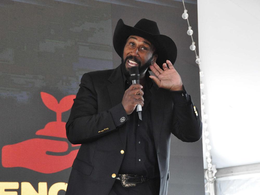 John Boyd Jr., founder and president of the National Black Farmers Association, asks for a louder response from the audience to a question during the Black, Indigenous and People of Color Farmers Conference at the Delaware State University farm near Smyrna on Nov. 12, 2024.