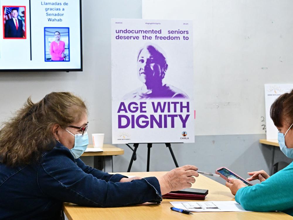 Immigrant seniors and people with disabilities call California lawmakers asking for support of a bill expanding immigrant benefits in August 2023.