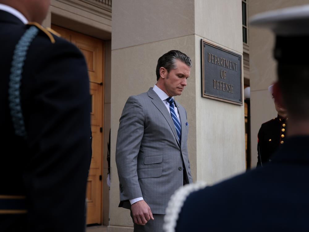 Secretary of Defense Pete Hegseth steps out to welcome Israeli Prime Minister Benjamin Netanyahu to the Pentagon during an honor cordon on Feb. 5.