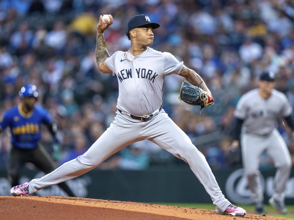 New York Yankees starter Luis Gil delivers a pitch during a baseball game against the Seattle Mariners, Sept. 17, 2024, in Seattle.