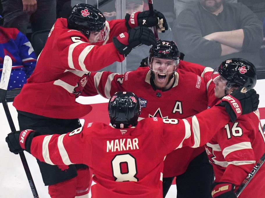 Canada's Connor McDavid (97) celebrates after his game-winning goal against the United States  on Thursday during an overtime period of the 4 Nations Face-Off championship hockey game in Boston. (AP Photo/Charles Krupa)