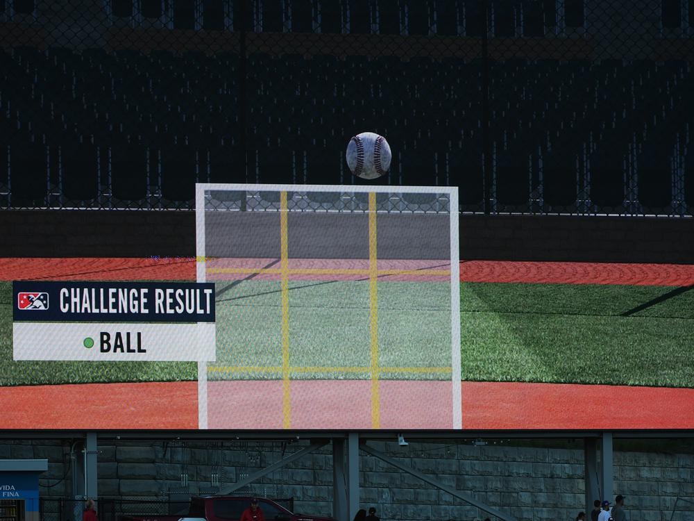 A view of a replay on the videoboard of an Automated Ball-Strike system challenge during a 