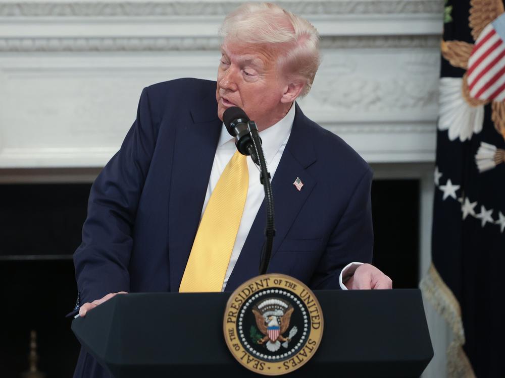 President Donald Trump addresses Gov. Janet Mills (D-ME) after she said, 