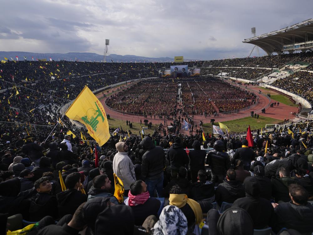 People gather for the funeral ceremony of the Lebanon's late Hezbollah leaders Hassan Nasrallah and Hashem Safieddine at the Sports City Stadium in Beirut, Lebanon, Sunday, Feb. 23, 2025.
