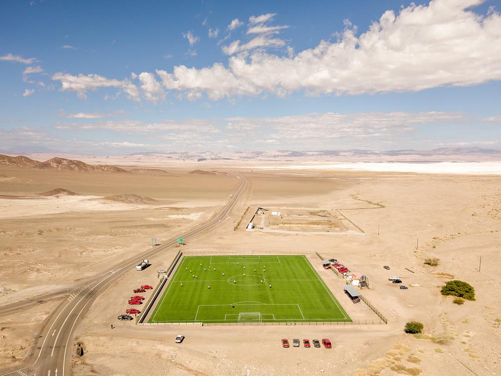 A football court, paid by lithium companies,  in the indiginous community of Peine, the closest town to the lithium mining operations, in the Atacama Salt Flat on Saturday 12 of April, 2024. Antofagasta, Chile.