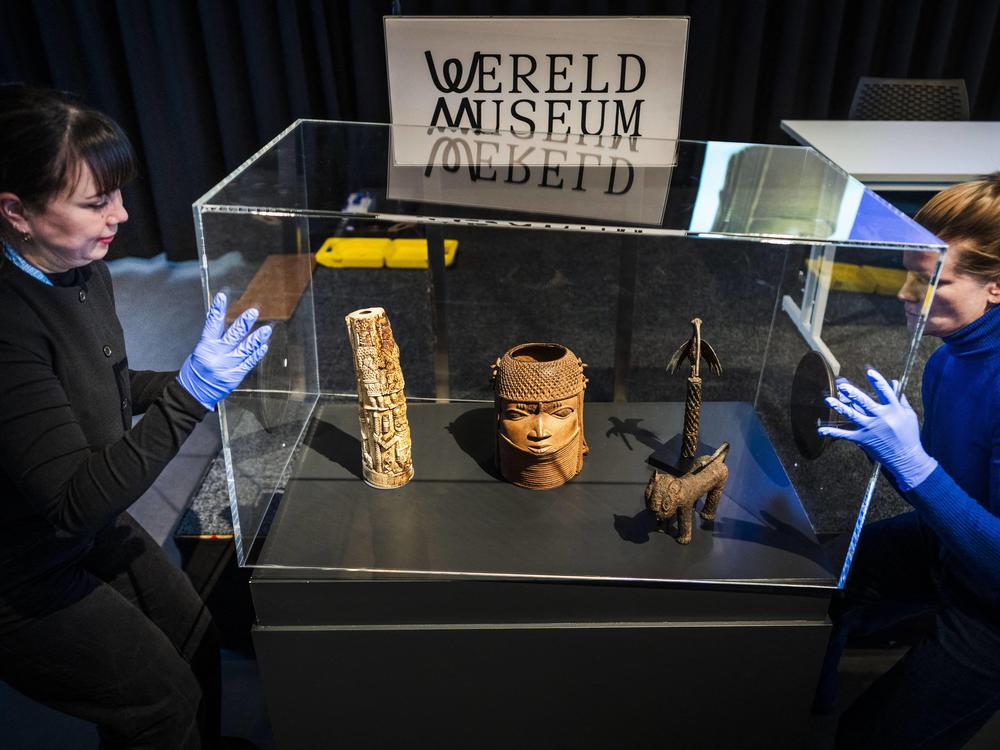 A glass case contains some of the Benin Bronzes that are being returned to Nigeria after British troops looted them in the late 19th century, seen during a handover ceremony at the Wereldmuseum (World Museum) in Leiden on Feb. 19, 2025.