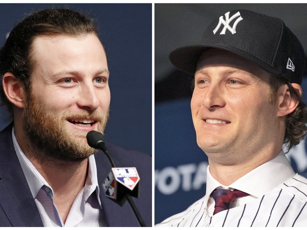 This combo of file photos shows Houston Astros starting pitcher Gerrit Cole on Oct. 14, 2019, and being introduced as a New York Yankees player on Dec. 18, 2019.