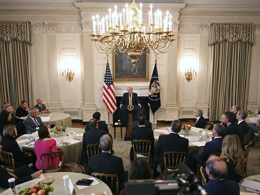President Trump speaks with governors in the White House last week. He challenged Maine Gov. Janet Mills about her state's policy on transgender student athletes, prompting her to answer, 