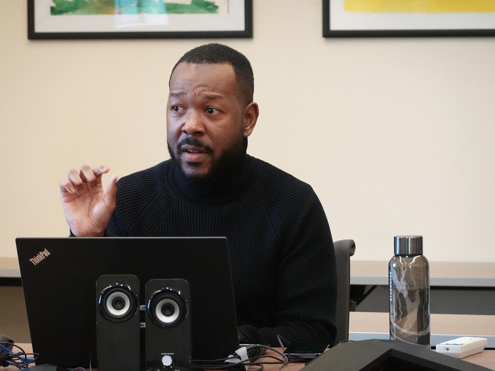 At the St. John's Community Health clinic in South Los Angeles, Darryn Harris teaches health workers about patients' constitutional right to remain silent during immigration arrests.