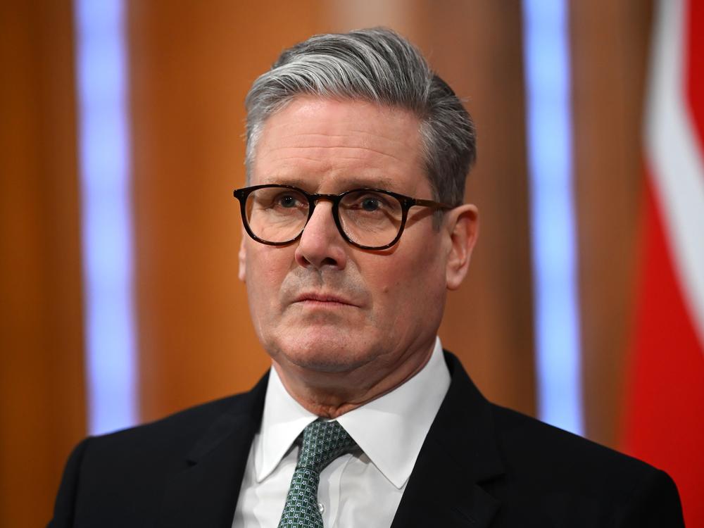 Prime Minister Keir Starmer delivers a statement on defense spending at Downing Street on Tuesday in London, ahead of his visit to Washington. He said Britain would increase defense spending to 2.5% of economic output by 2027, the country's biggest sustained increase in defense spending since the end of the Cold War. The U.K. will slash its aid budget to pay for this new expenditure.