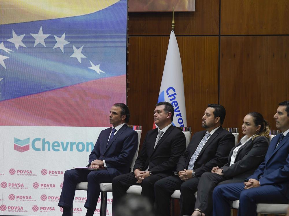 Chevron President in Venezuela, Javier La Rosa, left, attends a signing agreement ceremony between Venezuela and the California-based Chevron, in Caracas, Venezuela, Dec. 2, 2022.