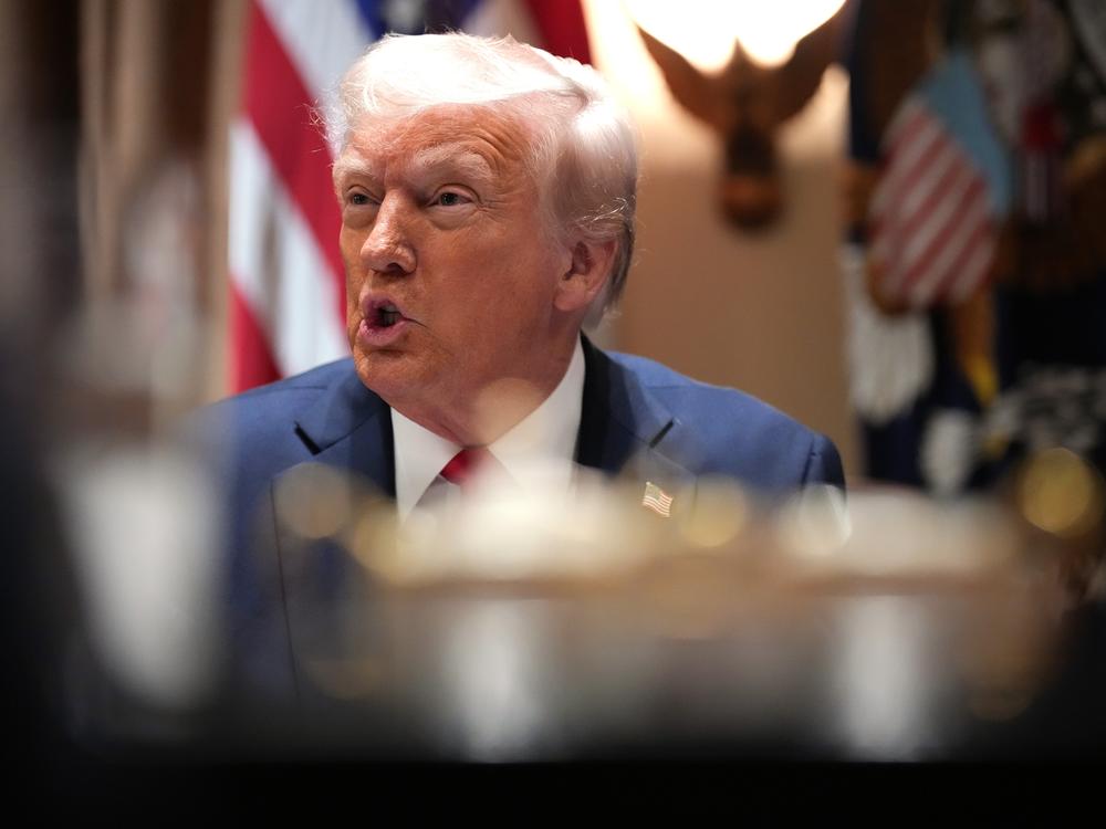 President Trump delivers remarks during a Cabinet meeting at the White House on Wednesday. During the meeting, Trump said he was looking at implementing tariffs against Canada and Mexico starting in April.