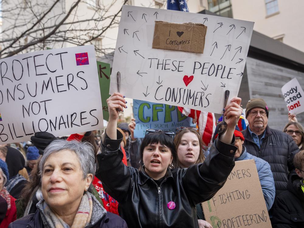 People protest in support of the Consumer Financial Protection Bureau (CFPB) headquarters in Washington, D.C., earlier this month.