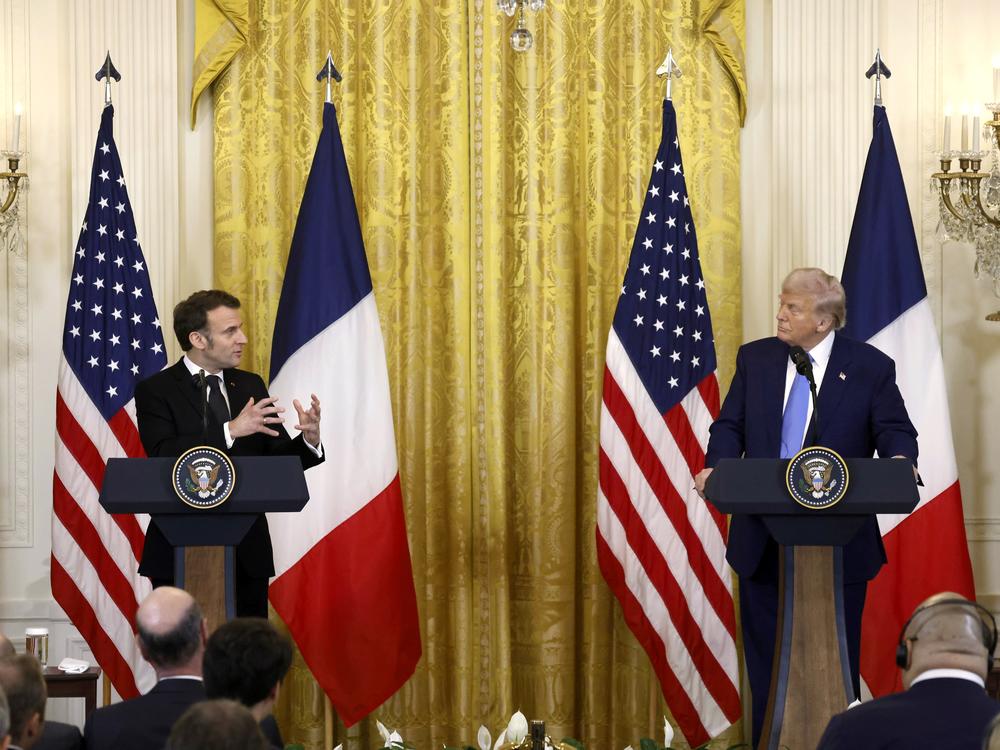 President Donald Trump, right, and France's President Emmanuel Macron attend a joint press conference in the East Room of the White House on Feb. 24.