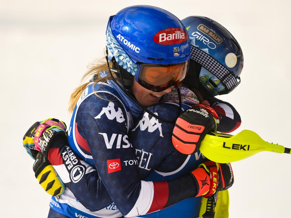 Mikaela Shiffrin (L) hugs teammate Paula Moltzan (R) during the  Slalom 2nd Run of Audi FIS Ski World Cup Sestriere 2025 on Feb. 23 in Sestriere, Italy.