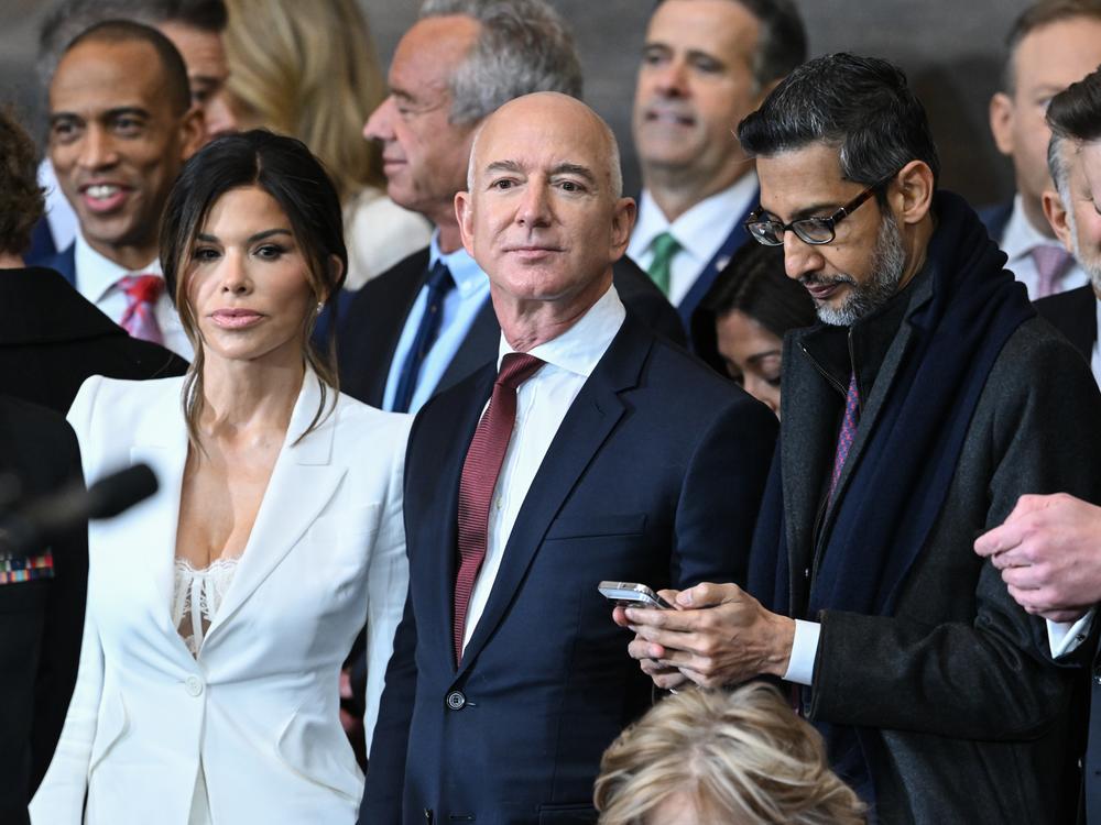 <em>Washington Post </em>owner Jeff Bezos, center, shown at the inauguration ceremony of President Trump at the U.S. Capitol in January.