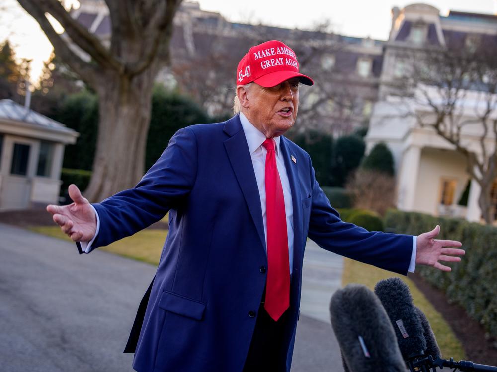 President Trump speaks to members of the media before boarding Marine One on the South Lawn of the White House on Feb. 28.